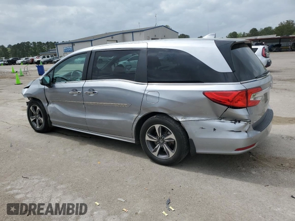 2018 Honda Odyssey Touring with VIN 5FNRL6H81JB078091, listed as a Copart auction lot 51372075 with 104,144 mi miles and Salvage Title. Bid and sale history available at carsss.com. Image 2.