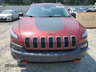 2015 Jeep Cherokee Trailhawk with VIN 1C4PJMBSXFW661218, listed as a Copart auction lot 61364895 with 139,200 mi miles and Salvage title. Bid and sale history available at DreamBid. Image 5.