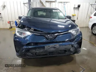2017 Toyota RAV4 LE with VIN JTMBFREV6HJ165878, listed as a Copart auction lot 58940845 with 120,897 mi miles and Salvage title. Bid and sale history available at DreamBid. Image 5.