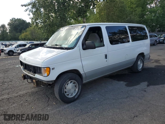 2002 Ford Econoline Passenger XL with VIN 1FMRE11WX2HA57114, listed as a Copart auction lot 68766174 with 167,382 mi miles and Salvage Title. Bid and sale history available at DreamBid. Image 1.
