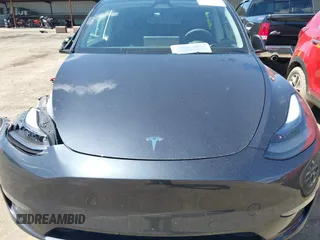 2024 Tesla Model Y Long Range with VIN 7SAYGAEE4RF078906, listed as a IAAI auction lot 42051207 with Not Provided miles and . Bid and sale history available at DreamBid. Image 10.