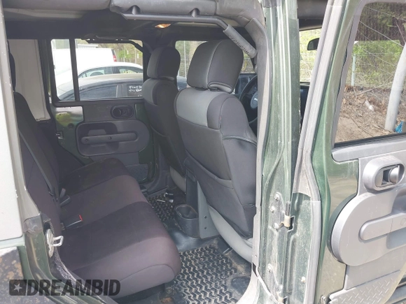 2007 Jeep Wrangler Unlimited X with VIN 1J4GA39147L101084, listed as a IAAI auction lot 41988628 with 194,562 mi miles and . Bid and sale history available at DreamBid. Image 8.