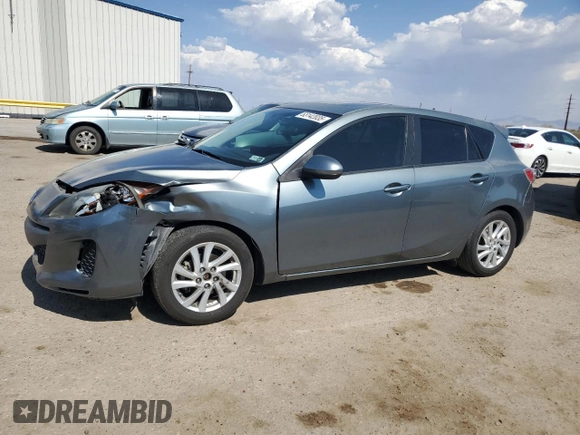 2012 Mazda 3 i Touring with VIN JM1BL1L7XC1534992, listed as a Copart auction lot 63142035 with 122,952 mi miles and Salvage title. Bid and sale history available at DreamBid. Image 1.