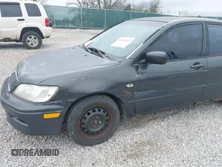 2003 Mitsubishi Lancer ES with VIN JA3AJ26E83U015342, listed as a IAAI auction lot 41819617 with 355,658 mi miles. Bid and sale history available at carsss.com. Image 6.