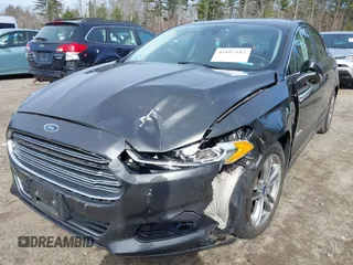 2015 Ford Fusion Energi Titanium with VIN 3FA6P0SU0FR200963, listed as a IAAI auction lot 41897182 with 104,100 mi miles. Bid and sale history available at carsss.com. Image 6.