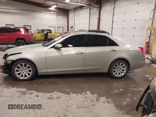 2014 Cadillac CTS Luxury AWD with VIN 1G6AX5S3XE0197628, listed as a IAAI auction lot 41400988 with 144,026 mi miles and . Bid and sale history available at DreamBid. Image 14.