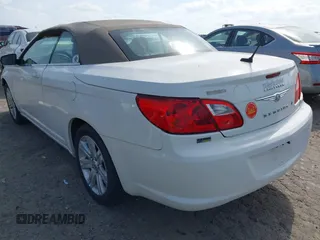 2010 Chrysler Sebring Touring with VIN 1C3BC5ED5AN105022, listed as a IAAI auction lot 42048657 with 188,920 mi miles and . Bid and sale history available at DreamBid. Image 3.