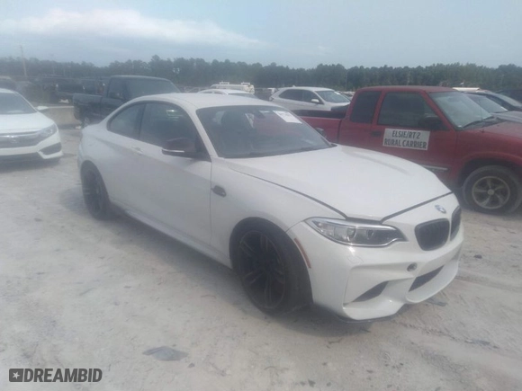 2017 BMW M2 with VIN WBS1H9C31HV888790, listed as a IAAI auction lot 36774031 with 82,821 mi miles. Bid and sale history available at carsss.com. Image 1.