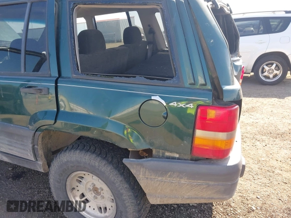 1998 Jeep Grand Cherokee Laredo с VIN 1J4GZ58S0WC154457, выставлен на аукционе IAAI как лот 42533109 с пробегом 214 953 миль миль и . История ставок и продаж доступна на DreamBid. Изображение 6.