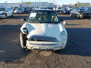 2004 MINI Hardtop with VIN WMWRC33464TJ58388, listed as a IAAI auction lot 40827409 with 102,322 mi miles and . Bid and sale history available at DreamBid. Image 12.