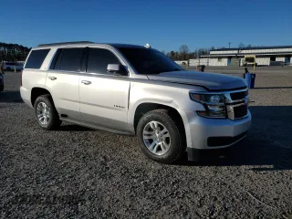 2015 Chevrolet Tahoe LS with VIN 1GNSCAKC1FR643336, listed as a Copart auction lot 47523105 with 113,656 mi miles and Salvage title. Bid and sale history available at DreamBid. Image 4.