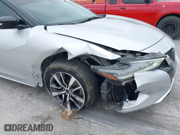 2020 Nissan Maxima SV with VIN 1N4AA6CVXLC380646, listed as a IAAI auction lot 42041422 with 99,579 mi miles and . Bid and sale history available at DreamBid. Image 6.