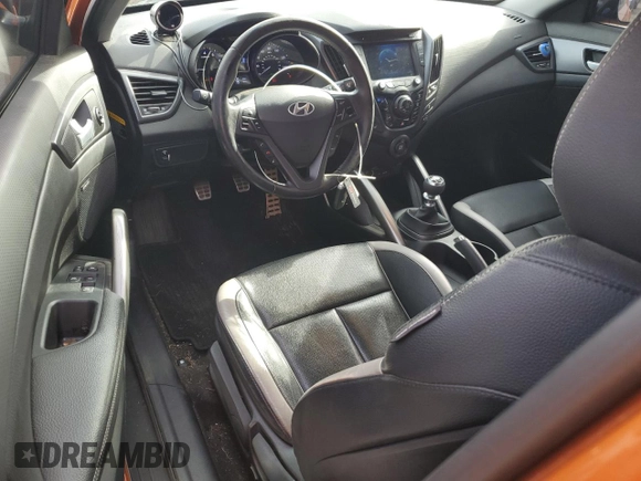 2013 Hyundai Veloster Turbo w/Black Int with VIN KMHTC6AE2DU173885, listed as a Copart auction lot 76492614 with 63,176 mi miles and Salvage Title. Bid and sale history available at carsss.com. Image 8.