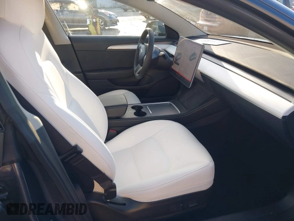 2022 Tesla Model 3 Long Range with VIN 5YJ3E1EB4NF293635, listed as a IAAI auction lot 41388234 with 28,396 mi miles and . Bid and sale history available at DreamBid. Image 5.