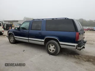 1996 Chevrolet Suburban with VIN 1GNEC16R8TJ359059, listed as a Copart auction lot 86344584 with 390,115 mi miles and Salvage Title. Bid and sale history available at carsss.com. Image 2.