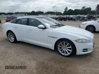 2015 Jaguar XJ with VIN SAJWA1CZ9F8V82974, listed as a Copart auction lot 59364344 with 64,012 mi miles and Salvage Title. Bid and sale history available at carsss.com. Image 4.