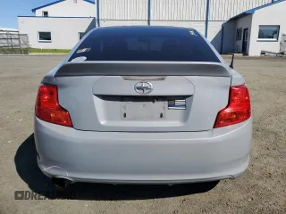 2012 Scion tC z VIN JTKJF5C71C3029365, wystawiony jako Copart lot #53423875 z przebiegiem 121 943 mil mil oraz Szkody całkowita. Historia ofert i sprzedaży dostępna na DreamBid. Obrazek 6.