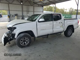 2016 Toyota Tacoma SR with VIN 5TFCZ5AN9GX014233, listed as a Copart auction lot 52016485 with 260,017 mi miles and Salvage Title. Bid and sale history available at carsss.com. Image 1.