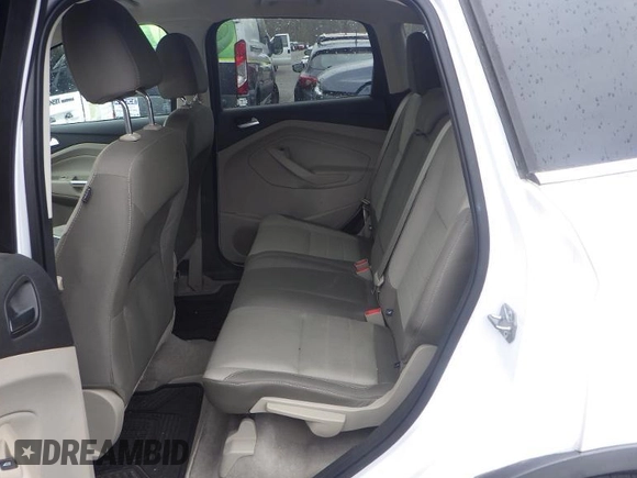 2016 Ford Escape SE z VIN 1FMCU9GX9GUC30370, wystawiony jako IAAI lot #42357731 z przebiegiem 101 531 mil mil oraz . Historia ofert i sprzedaży dostępna na DreamBid. Obrazek 1.