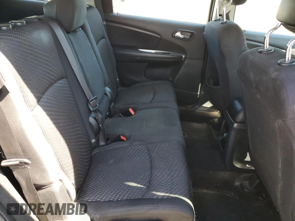 2015 Dodge Journey SE z VIN 3C4PDCAB8FT553477, wystawiony jako Copart lot #58097985 z przebiegiem 145 570 mil mil oraz Szkoda całkowita • Salvage title. Historia ofert i sprzedaży dostępna na DreamBid. Obrazek 11.