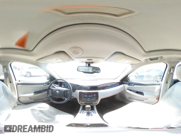 2014 Chevrolet Impala LTZ with VIN 2G1WC5E33E1164638, listed as a Copart auction lot 58699635 with 189,636 mi miles and Salvage title. Bid and sale history available at DreamBid. Image 14.