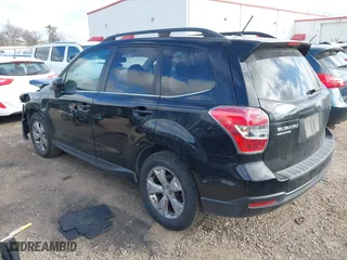 2014 Subaru Forester 2.5i Limited with VIN JF2SJAHC6EH460879, listed as a IAAI auction lot 41673548 with 114,950 mi miles. Bid and sale history available at carsss.com. Image 3.