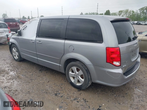 2013 Dodge Grand Caravan SE with VIN 2C4RDGBG2DR773577, listed as a IAAI auction lot 41823951 with 226,498 mi miles and . Bid and sale history available at DreamBid. Image 3.