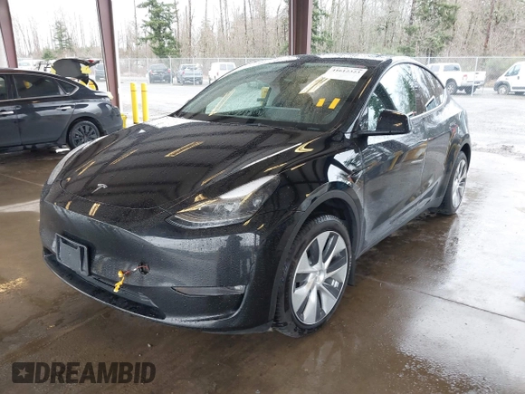 2023 Tesla Model Y Long Range with VIN 7SAYGAEE7PF739924, listed as a IAAI auction lot 41612323 with 75,226 mi miles and . Bid and sale history available at DreamBid. Image 16.