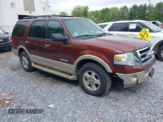 2007 Ford Expedition Eddie Bauer z VIN 1FMFU18527LA61052, wystawiony jako IAAI lot #42358316 z przebiegiem 163 531 mil mil oraz . Historia ofert i sprzedaży dostępna na DreamBid. Obrazek 1.