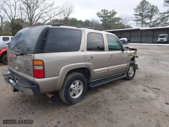 2002 Chevrolet Tahoe LT with VIN 1GNEC13Z22J256805, listed as a IAAI auction lot 41302460 with 249,578 mi miles. Bid and sale history available at carsss.com. Image 4.