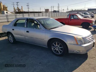 2011 Cadillac DTS Luxury Collection z VIN 1G6KD5E64BU109857, wystawiony jako Copart lot #71964104 z przebiegiem 130 609 mil mil oraz Szkoda całkowita • Salvage title. Historia ofert i sprzedaży dostępna na DreamBid. Obrazek 4.