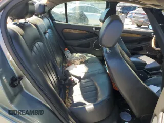 2004 Jaguar X-Type with VIN SAJEA51C04WD91344, listed as a Copart auction lot 49979285 with Not Provided miles and Salvage Title. Bid and sale history available at DreamBid. Image 10.