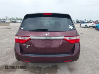 2012 Honda Odyssey EX-L with VIN 5FNRL5H61CB108301, listed as a IAAI auction lot 41939536 with 225,476 mi miles and . Bid and sale history available at DreamBid. Image 16.
