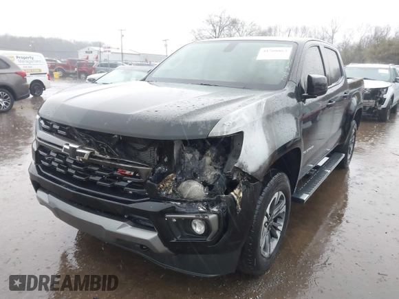 2022 Chevrolet Colorado 4WD Z71 with VIN 1GCGTDEN4N1205498, listed as a IAAI auction lot 41708863 with 54,515 mi miles and . Bid and sale history available at DreamBid. Image 6.