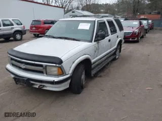 1997 Chevrolet Blazer LS with VIN 1GNDT13W3VK195996, listed as a IAAI auction lot 41777945 with 203,430 mi miles. Bid and sale history available at carsss.com. Image 2.