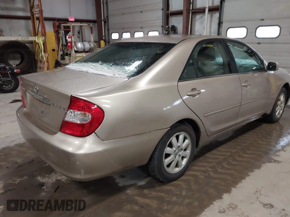 2003 Toyota Camry LE with VIN 4T1BE32K73U136399, listed as a IAAI auction lot 41877554 with 235,078 mi miles and . Bid and sale history available at DreamBid. Image 4.