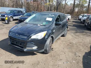 2014 Ford Escape SE with VIN 1FMCU9GXXEUA57133, listed as a IAAI auction lot 41642184 with 1 mi miles. Bid and sale history available at carsss.com. Image 2.