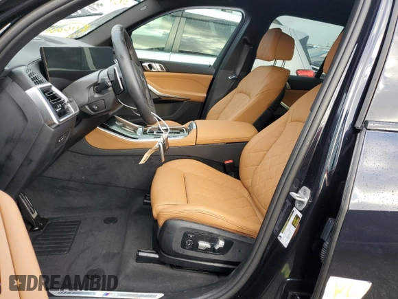 2025 BMW X5 sDrive40i with VIN 5UX13EU05S9W56291, listed as a Copart auction lot 73857164 with 0 mi miles and Salvage Title. Bid and sale history available at carsss.com. Image 7.