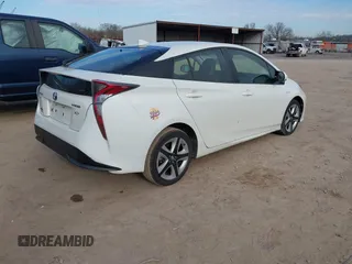 2016 Toyota Prius Four with VIN JTDKARFU3G3021048, listed as a IAAI auction lot 41633306 with 120,632 mi miles. Bid and sale history available at carsss.com. Image 4.