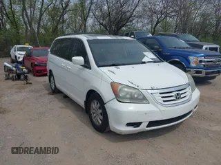 2008 Honda Odyssey EX-L with VIN 5FNRL38618B103708, listed as a IAAI auction lot 42071190 with 169,803 mi miles. Bid and sale history available at carsss.com. Image 1.