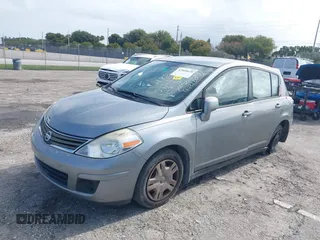 2011 Nissan Versa 1.8 SL with VIN 3N1BC1CP3BL402120, listed as a IAAI auction lot 42006620 with 147,023 mi miles. Bid and sale history available at carsss.com. Image 2.