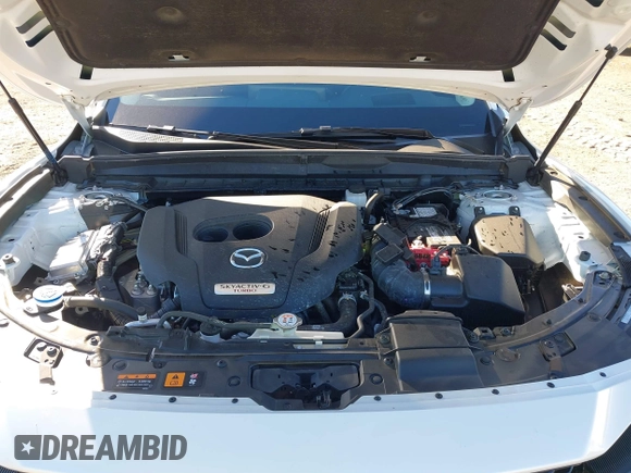2024 Mazda CX-50 Premium z VIN 7MMVABDY0RN186511, wystawiony jako IAAI lot #41229255 z przebiegiem 21 842 mil mil oraz . Historia ofert i sprzedaży dostępna na DreamBid. Obrazek 10.