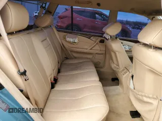 2001 Mercedes-Benz E-Class with VIN WDBJH65J01B292156, listed as a Copart auction lot 49556935 with 179,223 mi miles and Salvage Title. Bid and sale history available at carsss.com. Image 11.