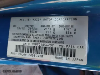 2012 Mazda Mazda3 i Touring with VIN JM1BL1V87C1654707, listed as a IAAI auction lot 41920730 with 140,272 mi miles. Bid and sale history available at carsss.com. Image 9.