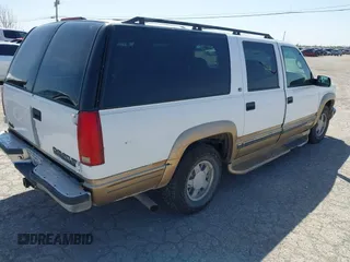 1999 Chevrolet Suburban with VIN 3GNEC16R6XG266922, listed as a IAAI auction lot 41992370 with 370,843 mi miles. Bid and sale history available at carsss.com. Image 4.