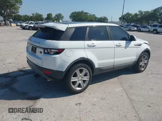 2015 Land Rover Range Rover Evoque Pure Premium z VIN SALVR2BG0FH964683, wystawiony jako IAAI lot #42016766 z przebiegiem 94 942 mil mil oraz . Historia ofert i sprzedaży dostępna na DreamBid. Obrazek 4.