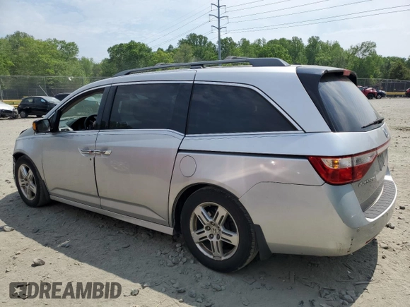 2012 Honda Odyssey Touring with VIN 5FNRL5H93CB121366, listed as a Copart auction lot 55383885 with 197,885 mi miles and Salvage title. Bid and sale history available at DreamBid. Image 2.