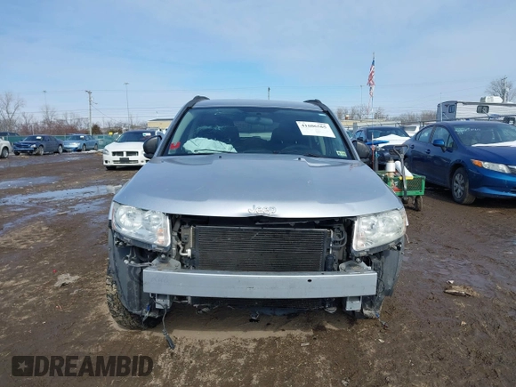 2012 Jeep Compass Sport with VIN 1C4NJCBA3CD601569, listed as a IAAI auction lot 41606565 with 126,630 mi miles. Bid and sale history available at carsss.com. Image 6.