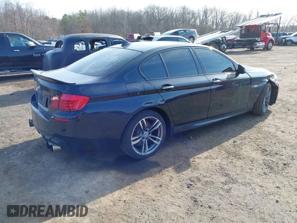 2013 BMW 5 Series 535i xDrive with VIN WBAFU7C50DDU77411, listed as a IAAI auction lot 41796299 with 138,944 mi miles and . Bid and sale history available at carsss.com. Image 4.