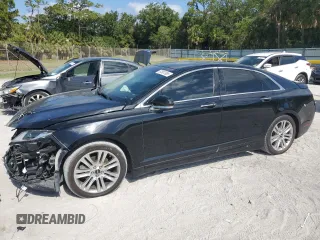 2016 Lincoln MKZ z VIN 3LN6L2J96GR601042, wystawiony jako Copart lot #57807955 z przebiegiem 102 191 mil mil oraz Szkoda całkowita • Salvage title. Historia ofert i sprzedaży dostępna na DreamBid. Obrazek 1.